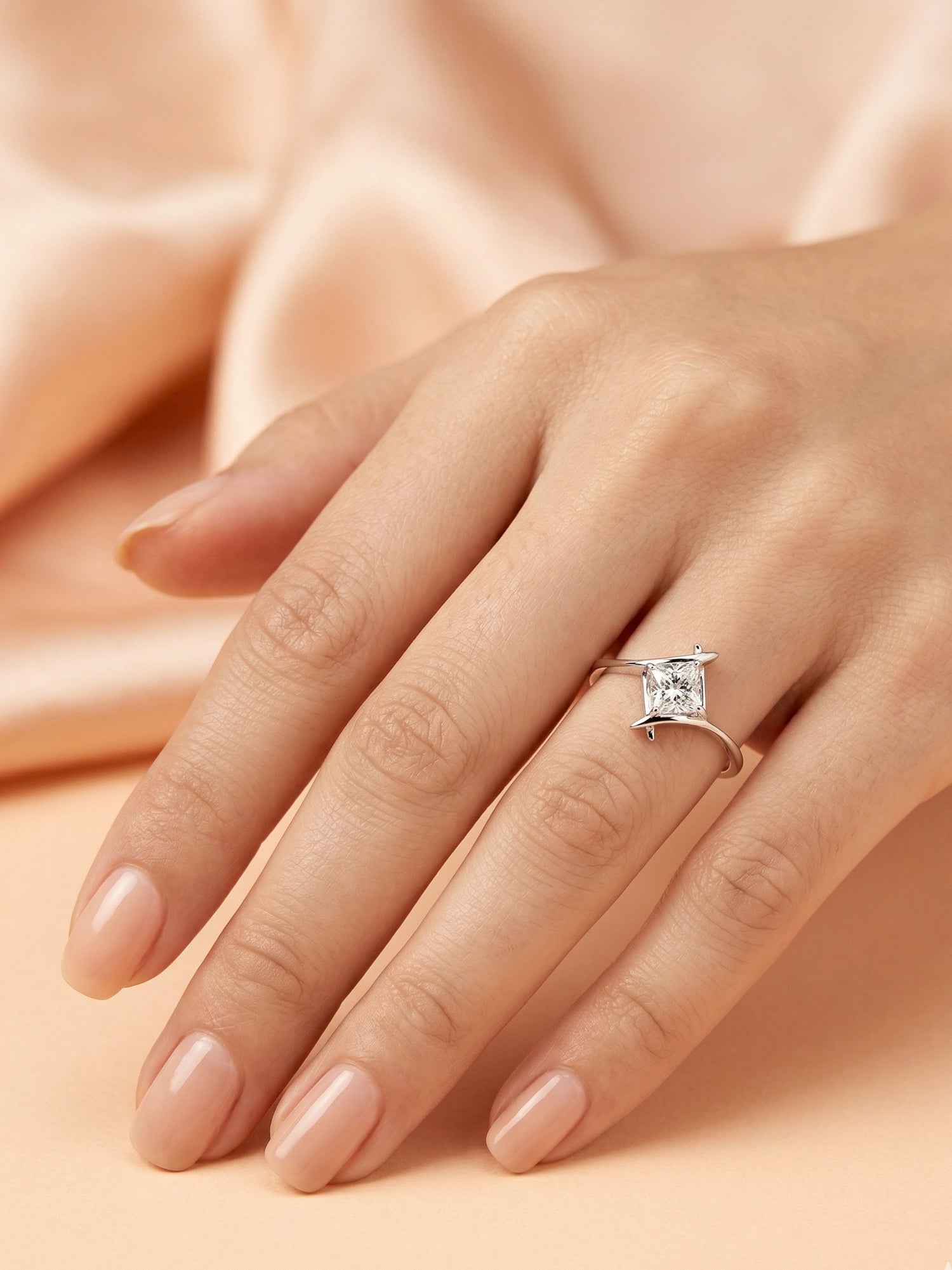 Kite-Oriented Princess Solitaire Ring