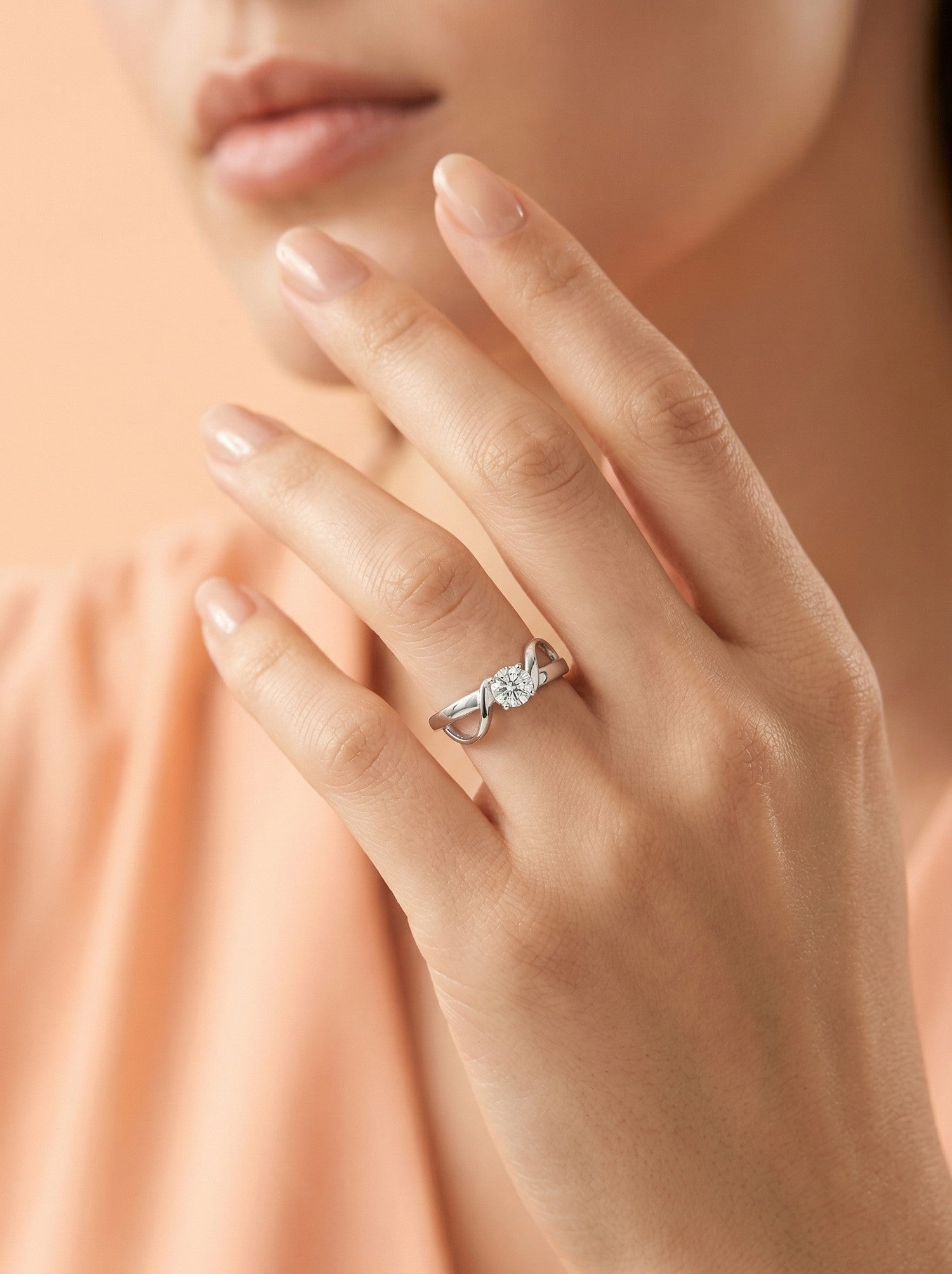 Entwined Ribbon Solitaire Ring