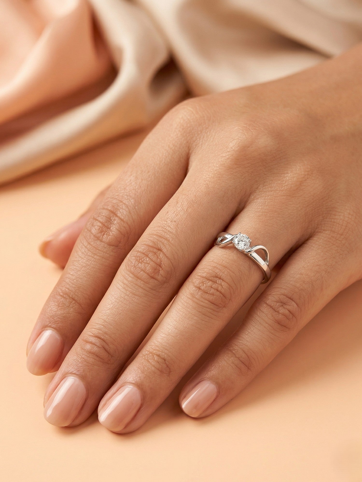 Entwined Ribbon Solitaire Ring