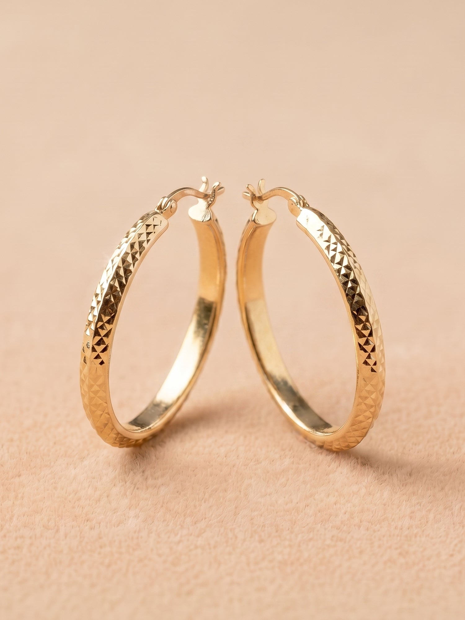 Diamond-Cut Oval Hoop Earrings