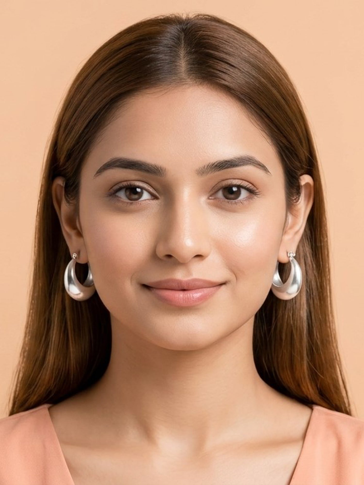 Sleek Silver Crescent Hoops