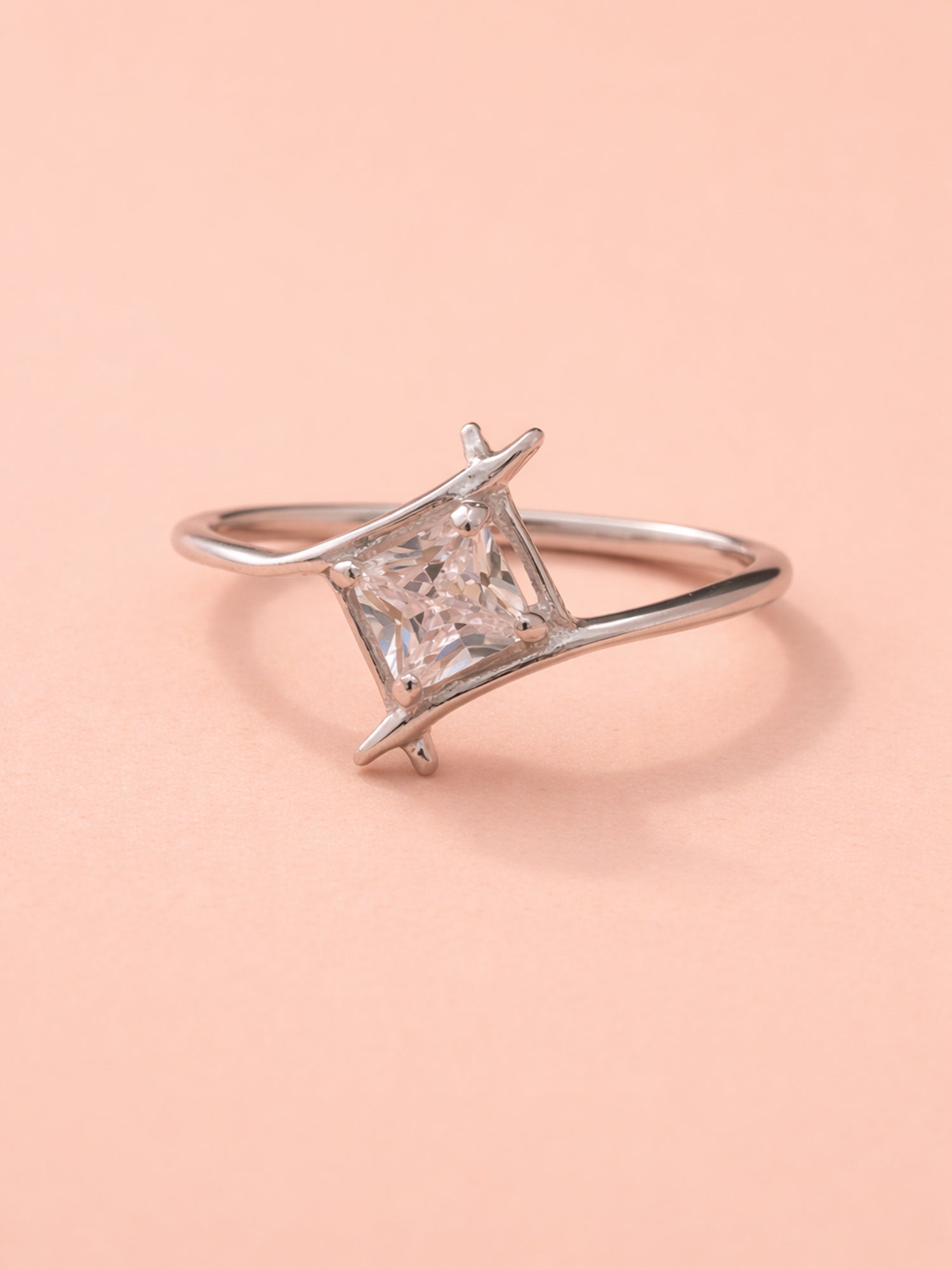 Kite-Oriented Princess Solitaire Ring