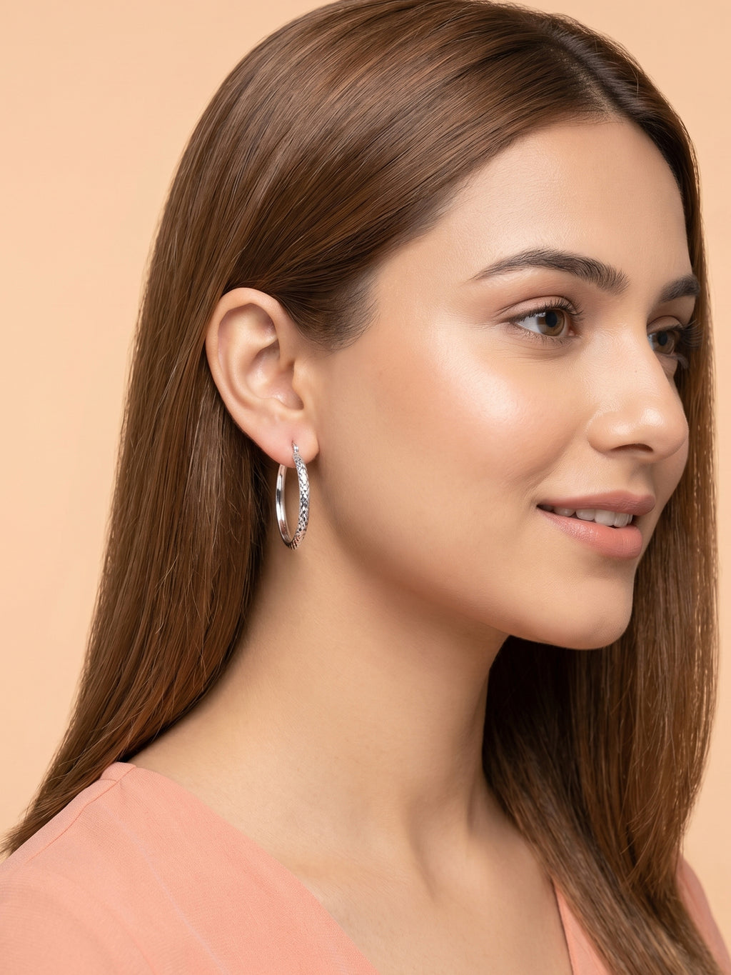 Faceted Diamond-Cut Oval Hoop Earrings