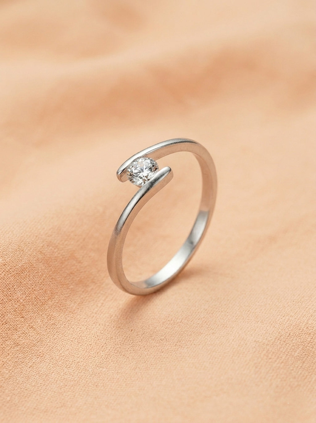 Silver Fluid Tension-Style Solitaire Ring