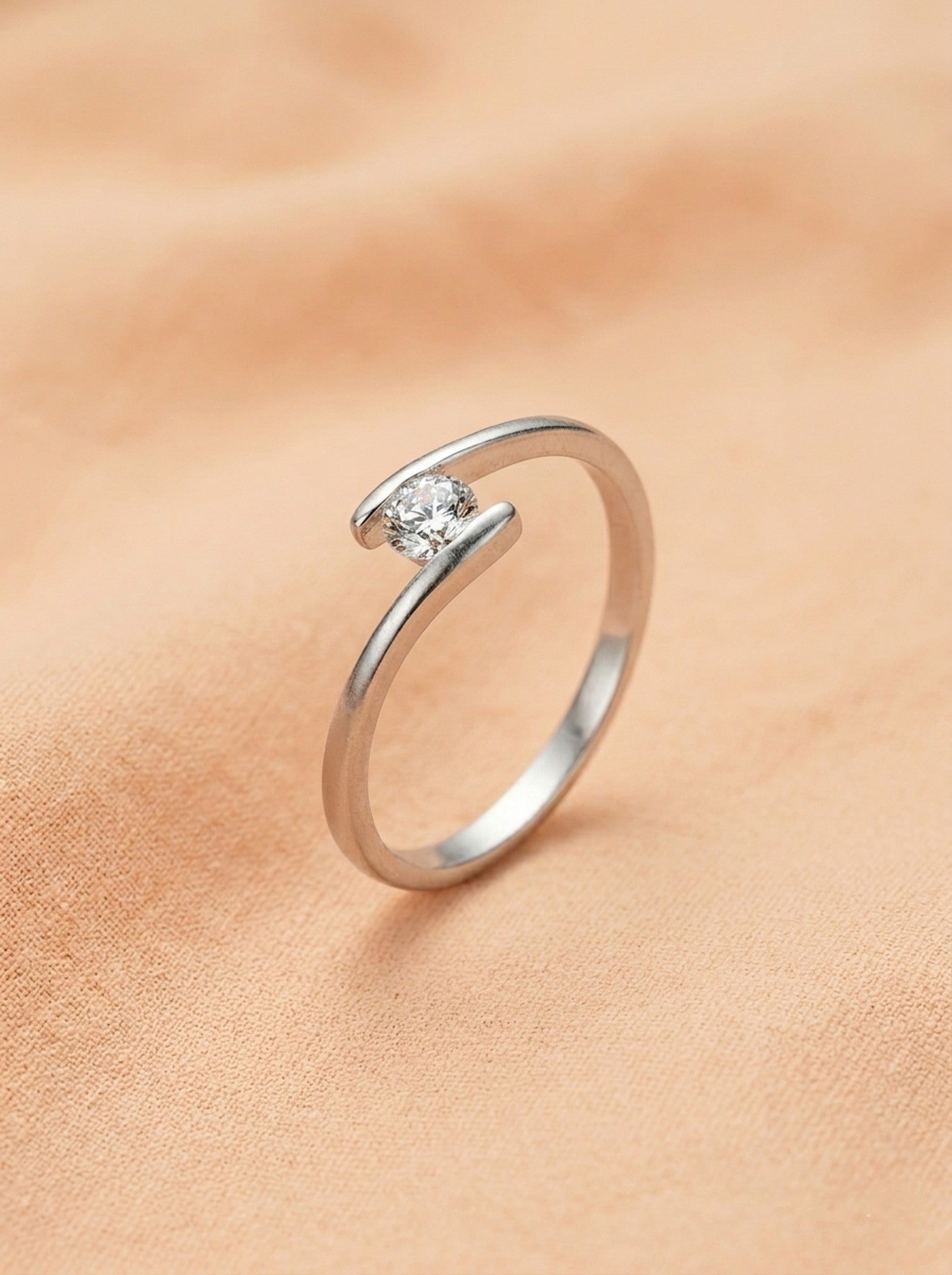 Silver Fluid Tension-Style Solitaire Ring