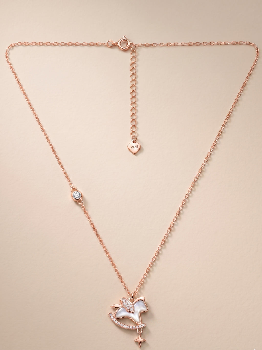 Roseate Shimmering Rocking Horse Pendant Necklace