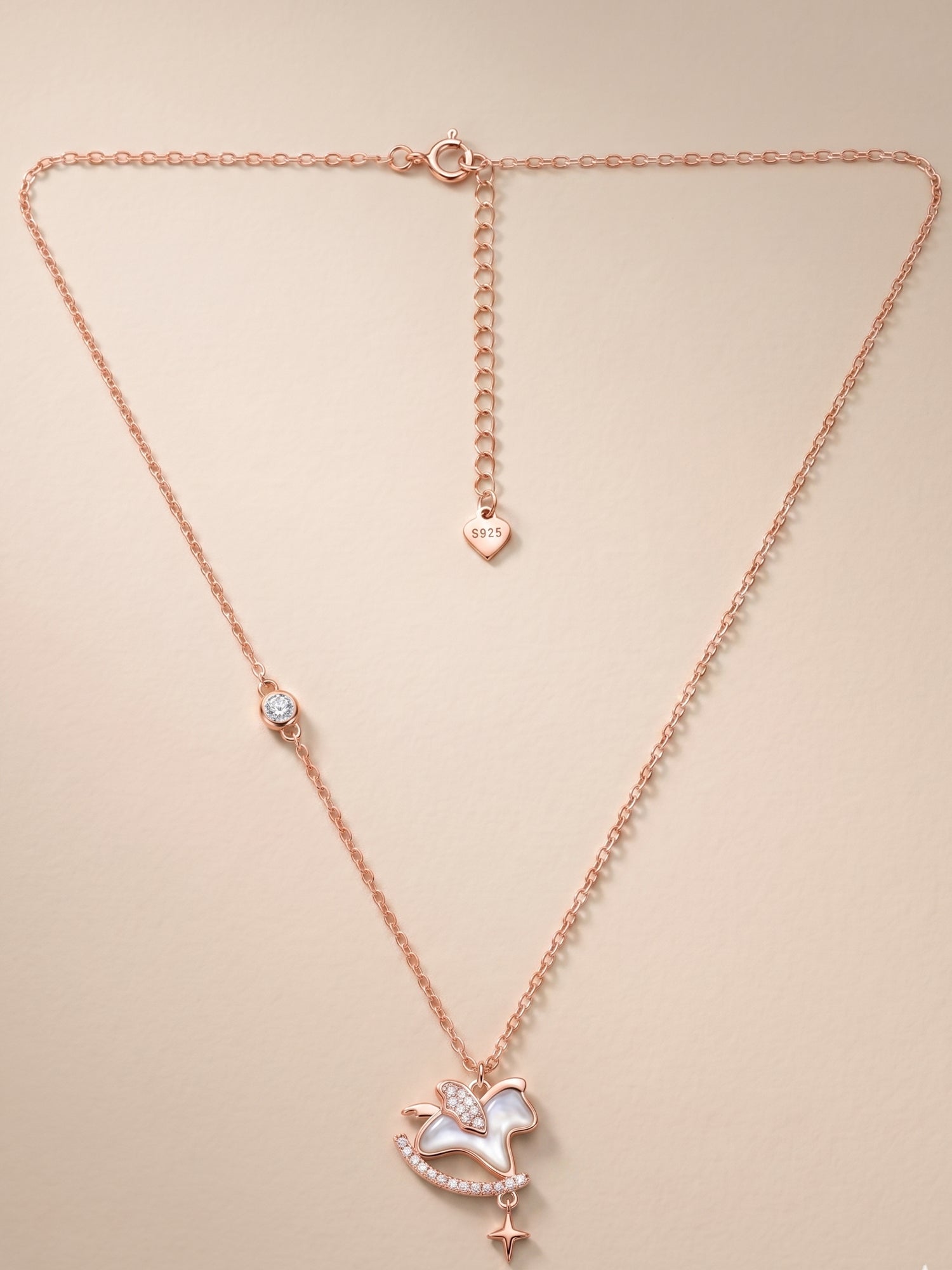 Roseate Shimmering Rocking Horse Pendant Necklace