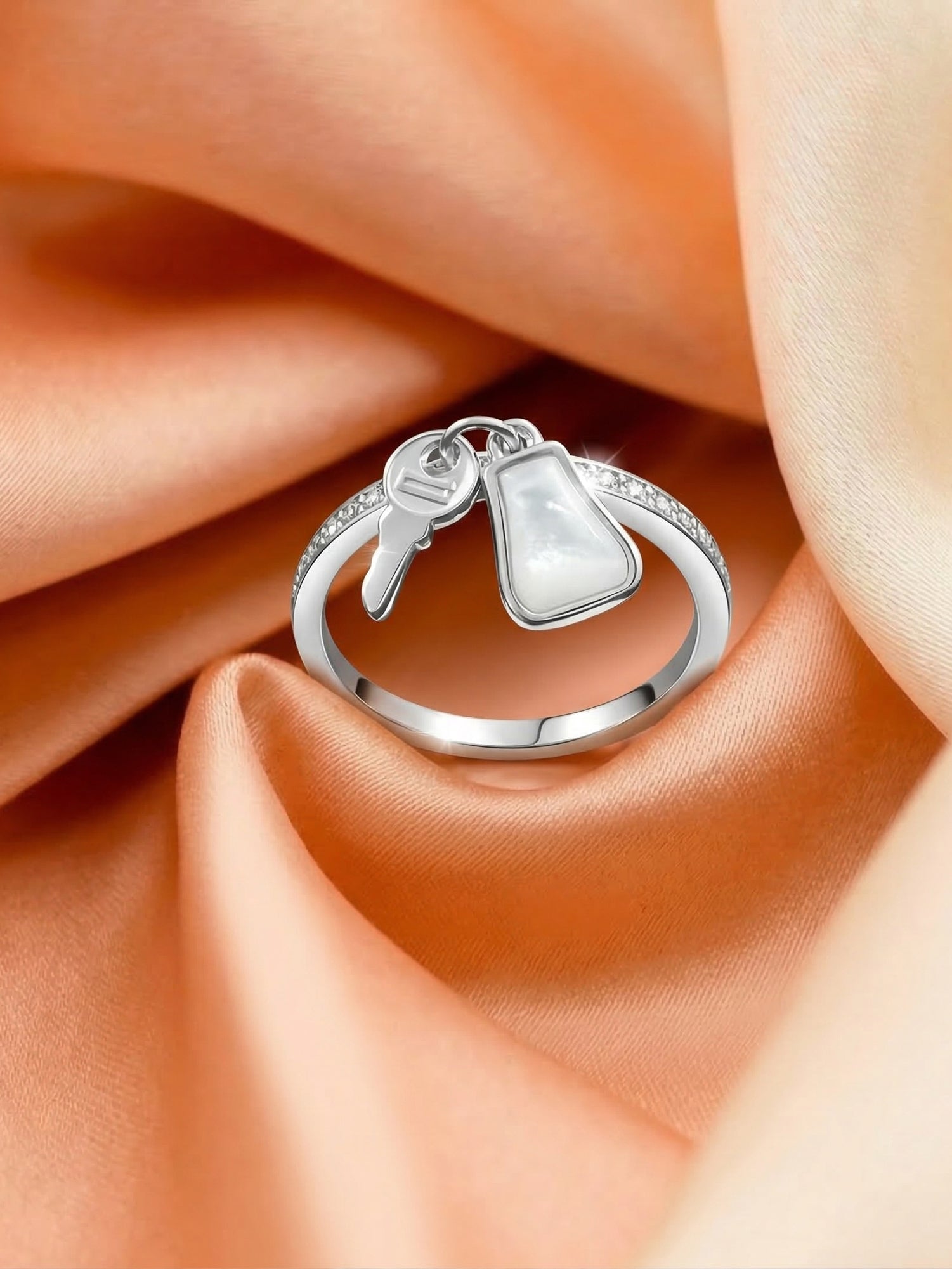 Key Luminous Charm Ring