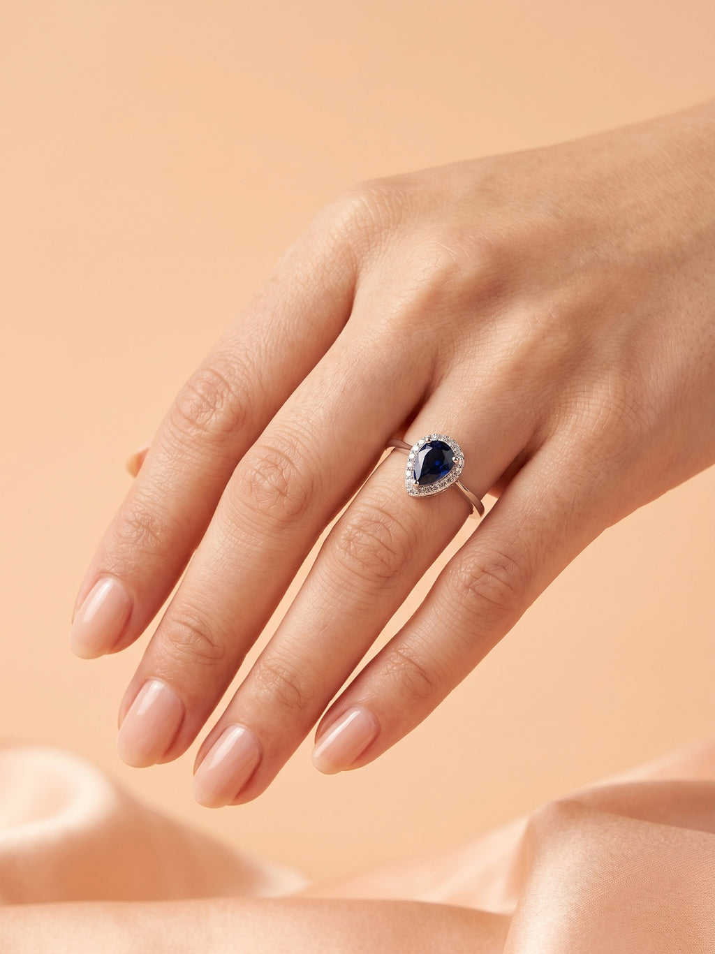 Blue Pear Cut Halo Ring
