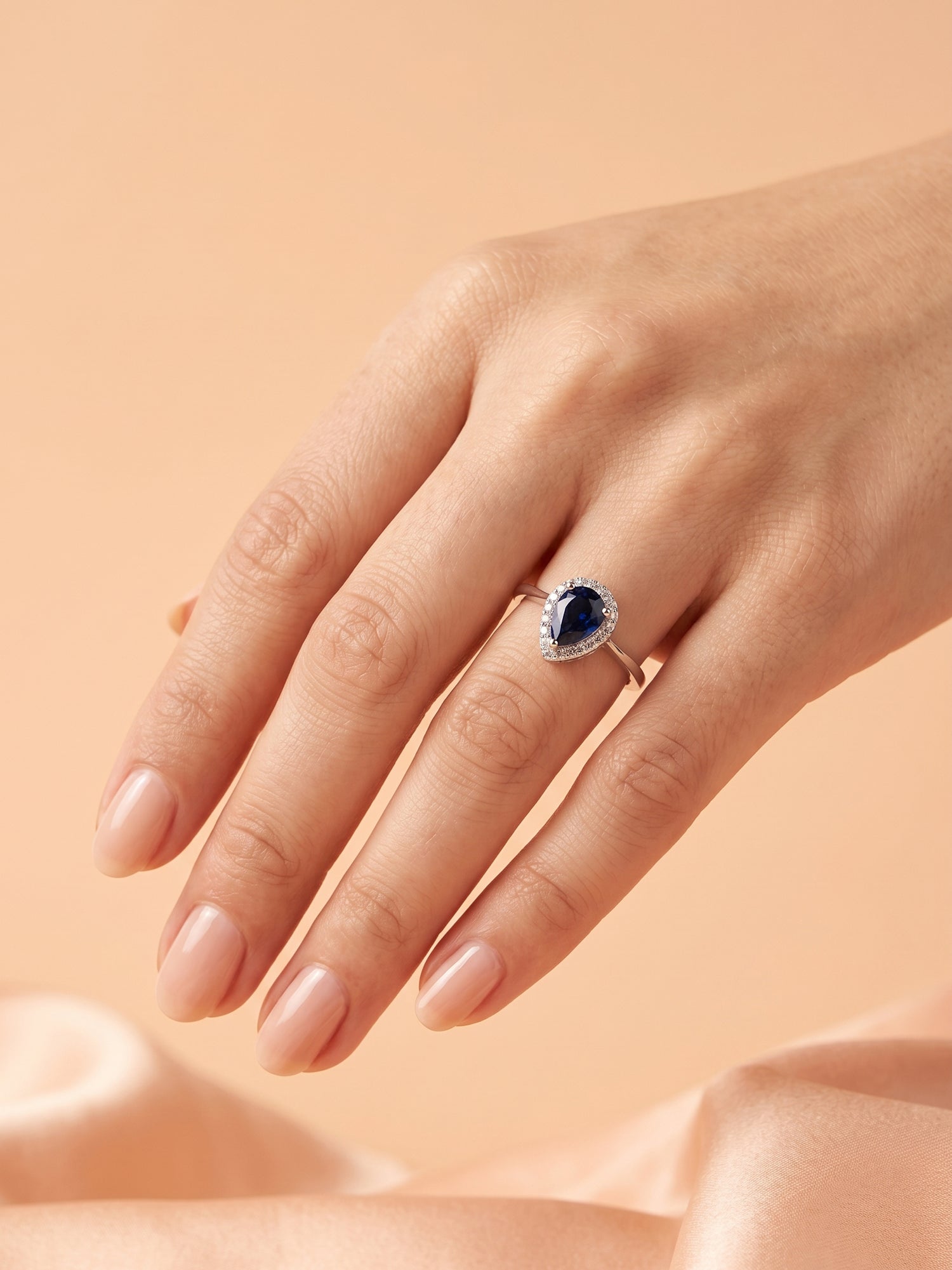 Blue Pear Cut Halo Ring