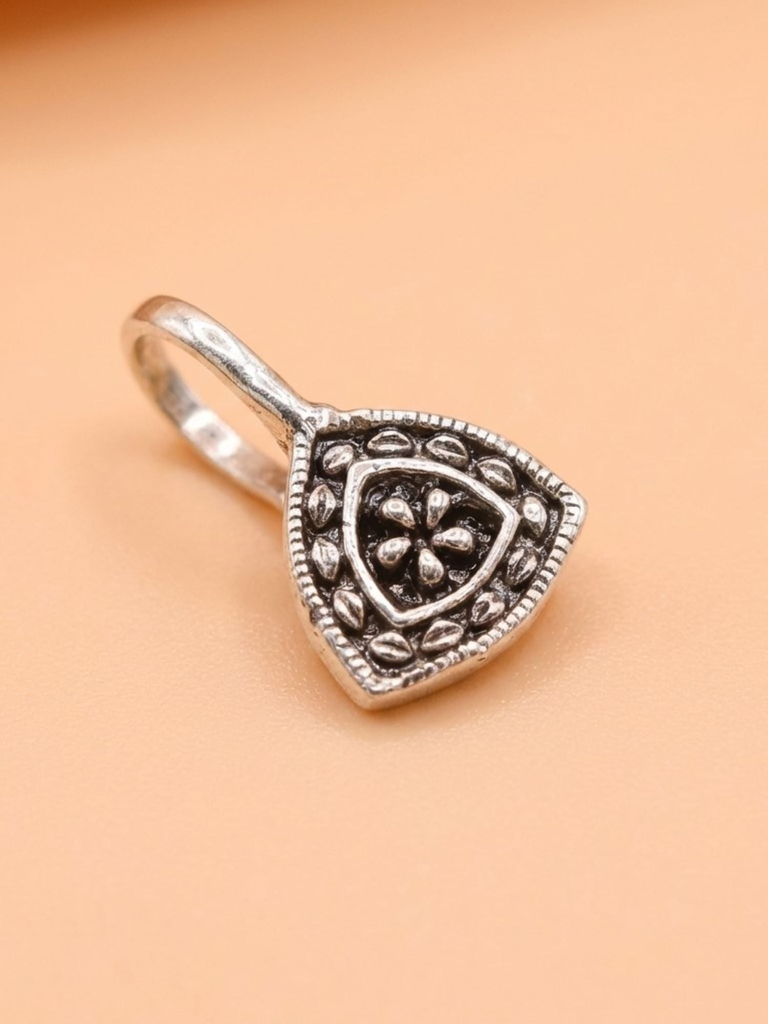 Oxidized Floral Shield Nose Pin