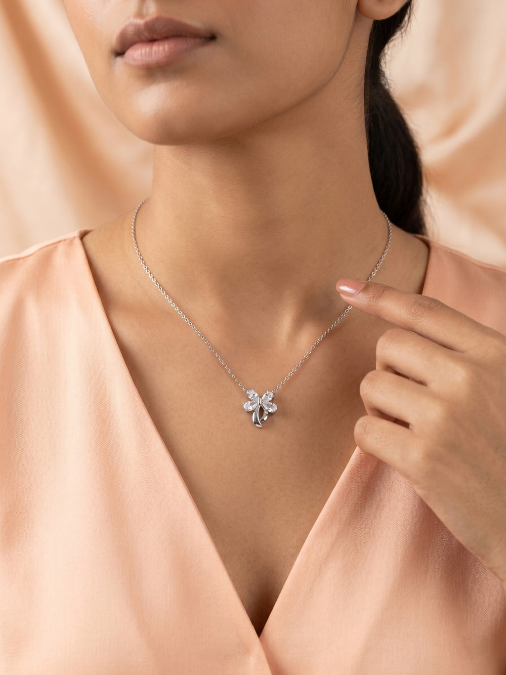 Silver Shimmering Ribbon Bow Pendant Necklace