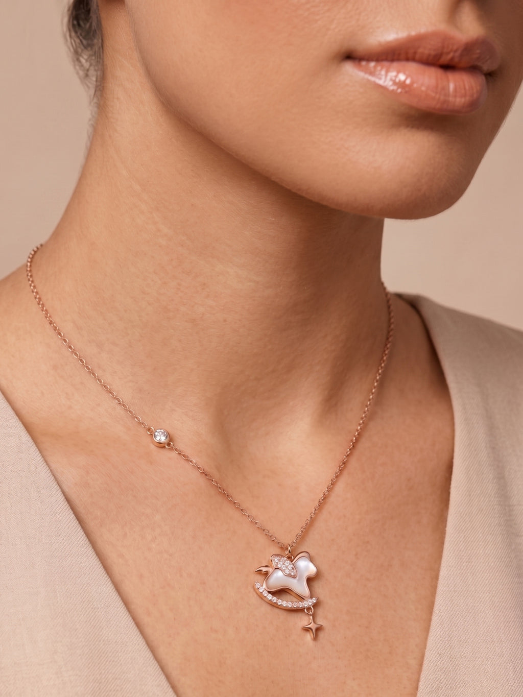 Roseate Shimmering Rocking Horse Pendant Necklace