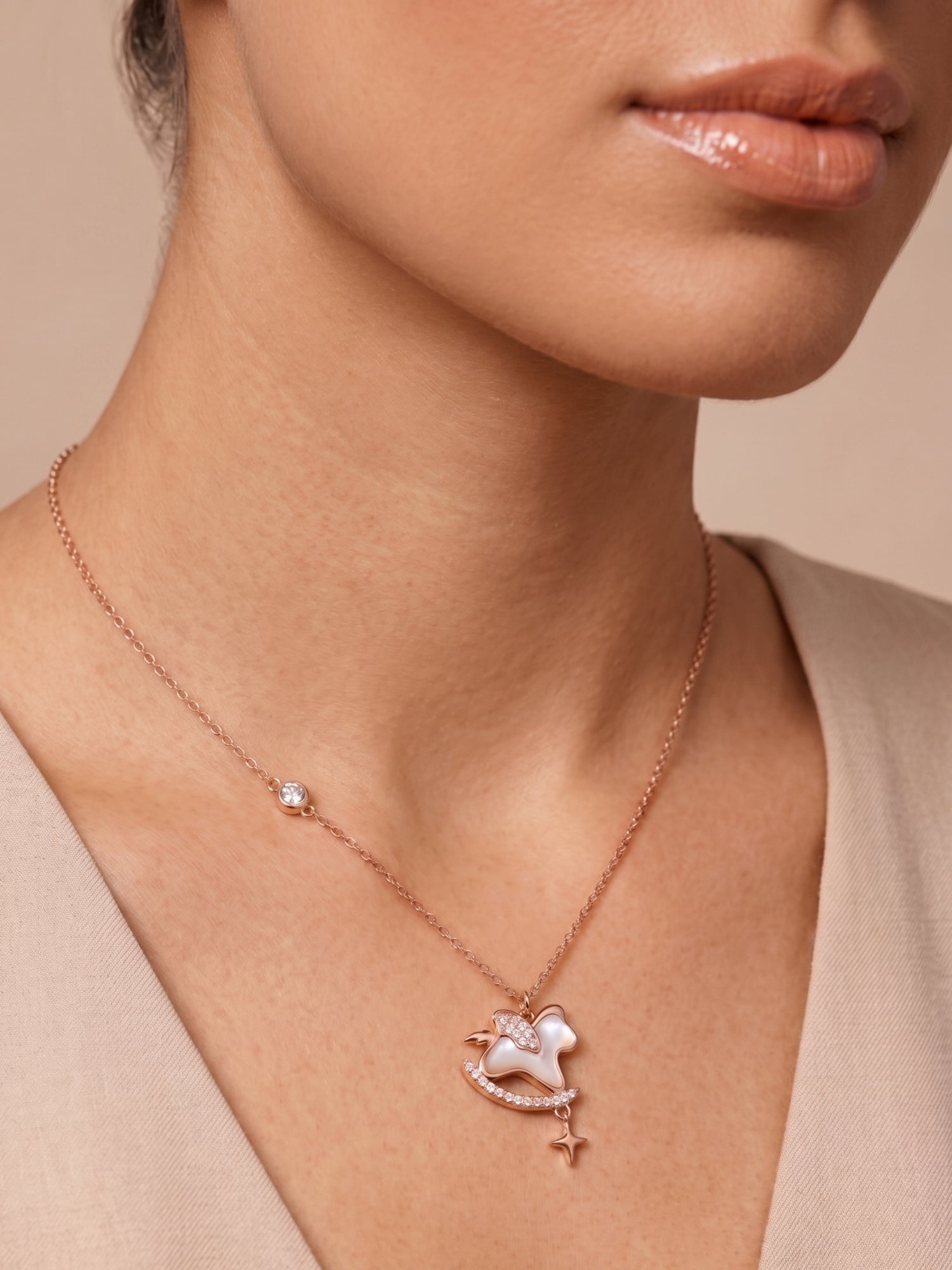 Roseate Shimmering Rocking Horse Pendant Necklace