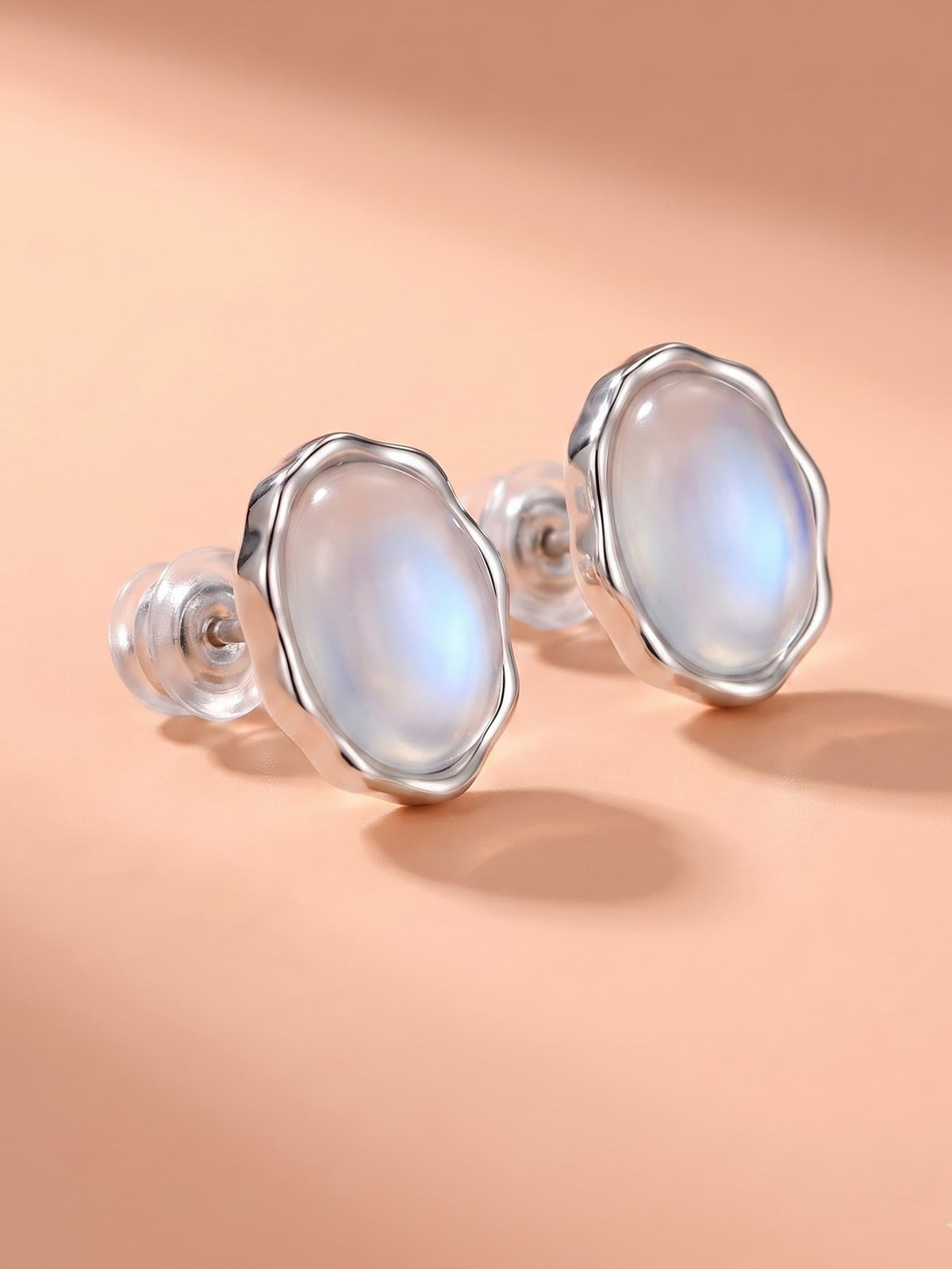 The Celestia Oval Moonstone Wave Stud Earrings