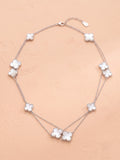 The Layered Luminance Mother-of-Pearl Clover Station Necklace