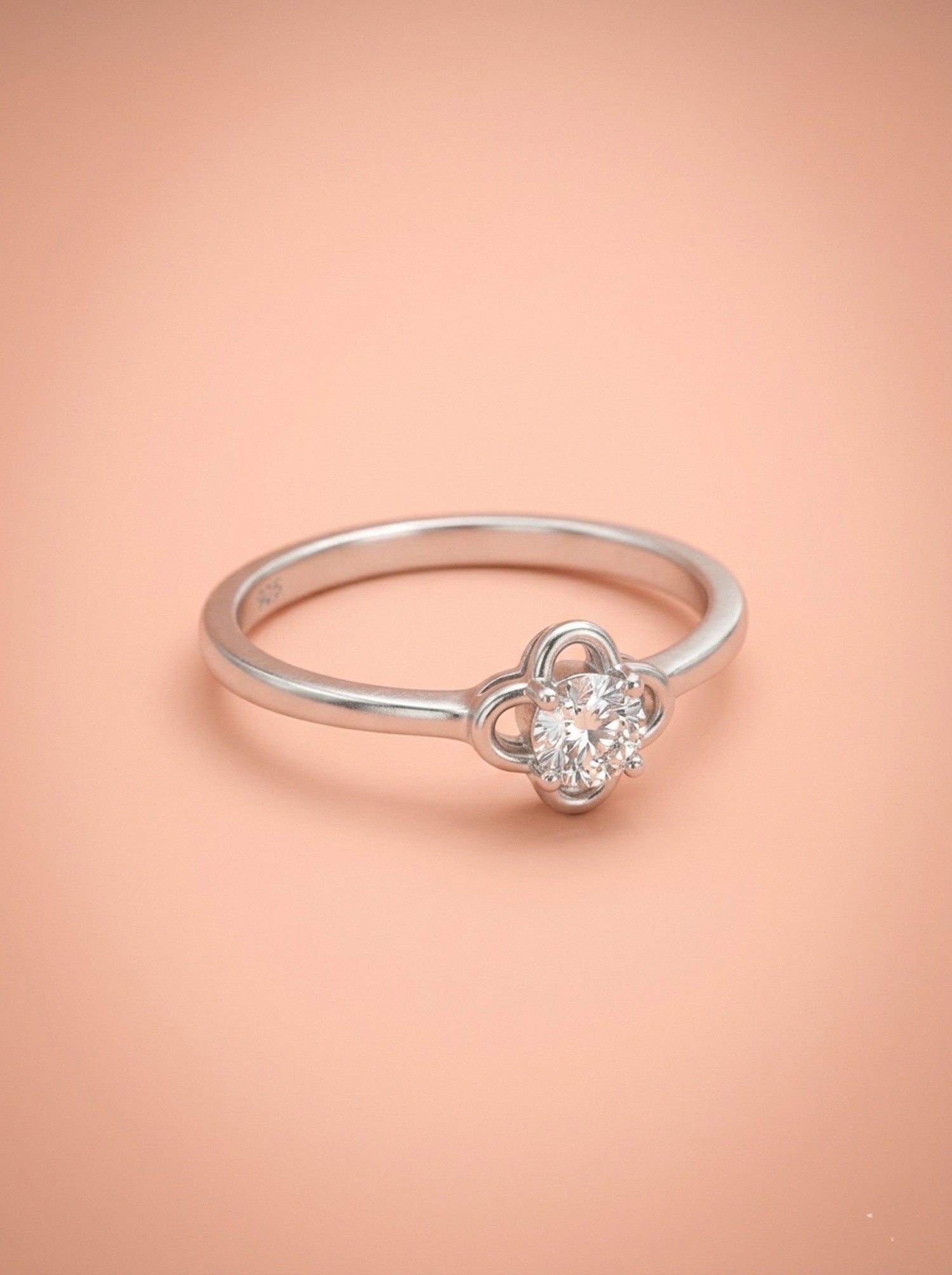 Silver Petal Openwork Solitaire Ring