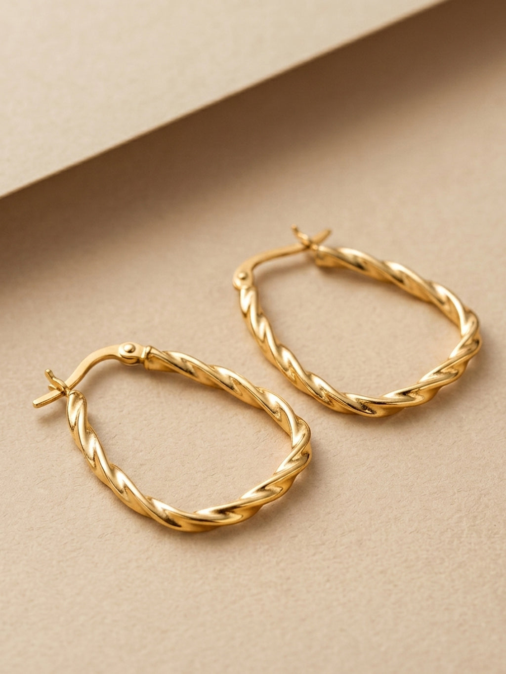 Gilded Twisted Triangular Hoops