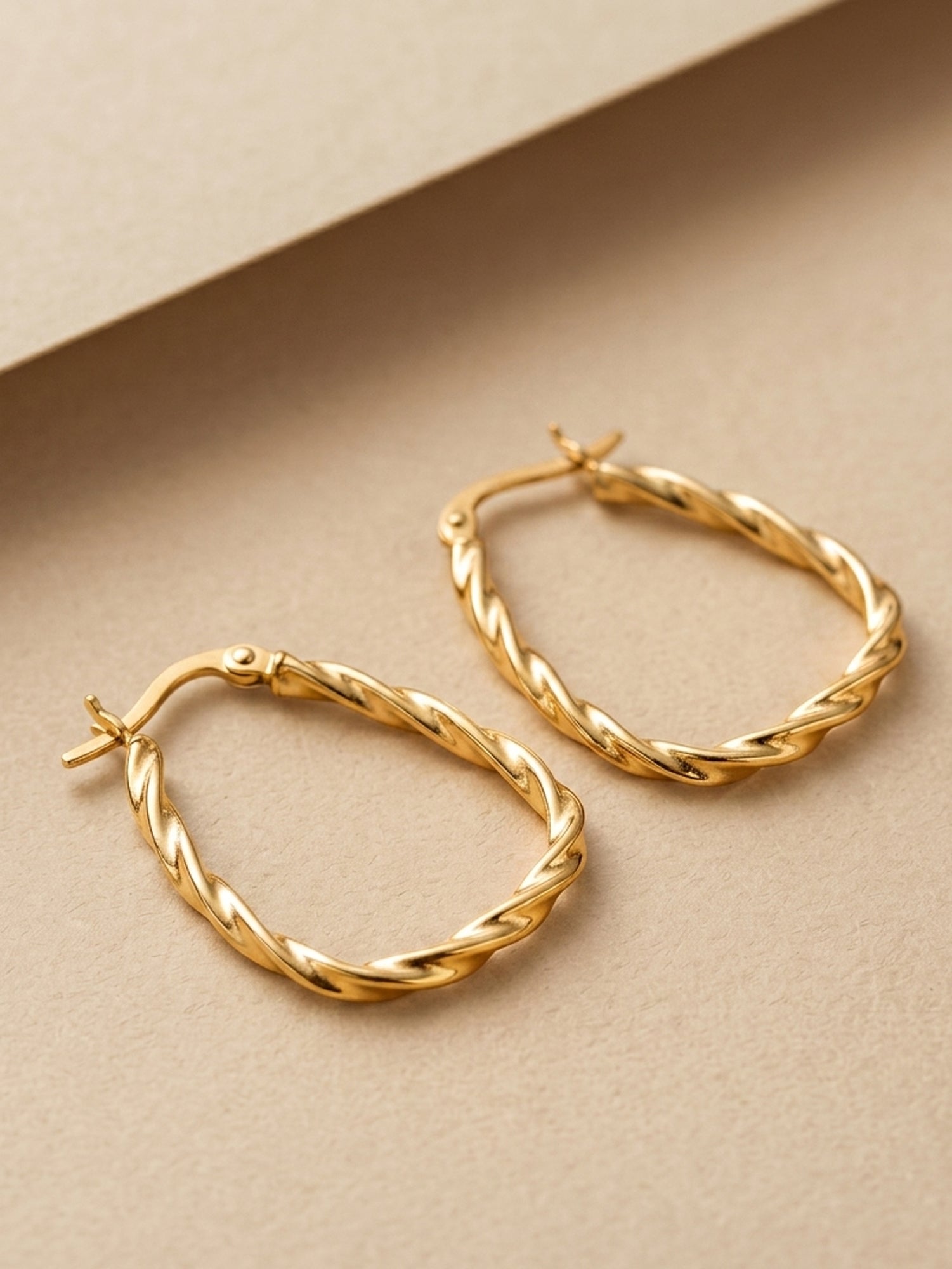 Gilded Twisted Triangular Hoops
