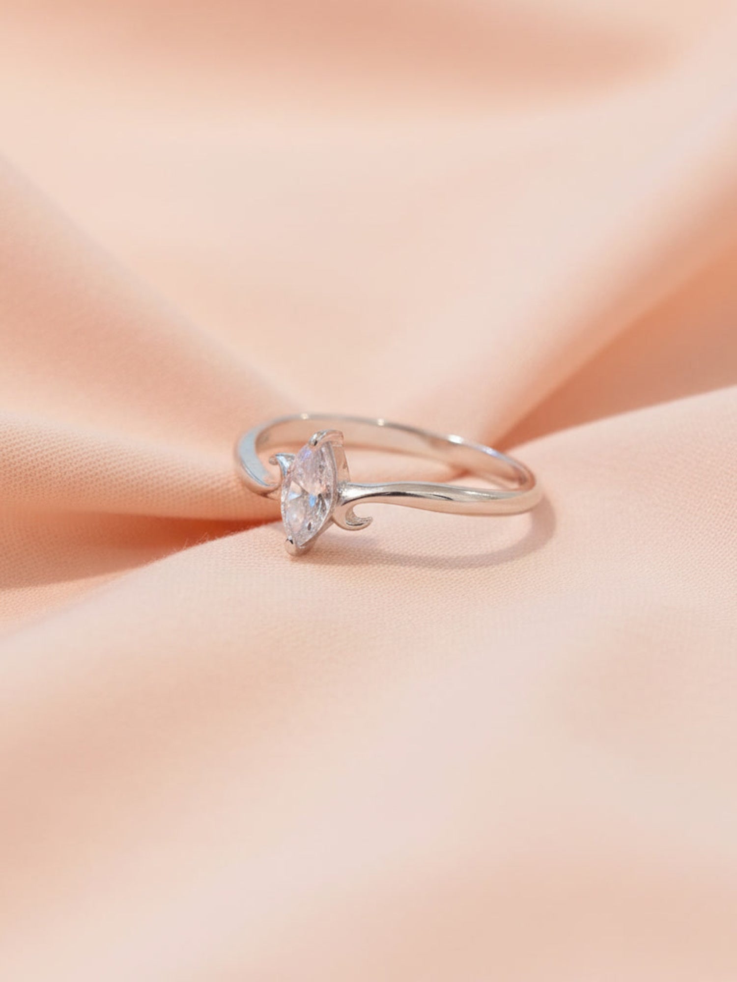 Marquise Swirl Solitaire Ring