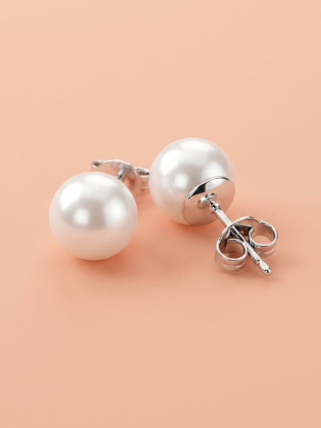 The Celestial Grace: Classic Sterling Silver Pearl Stud Earrings