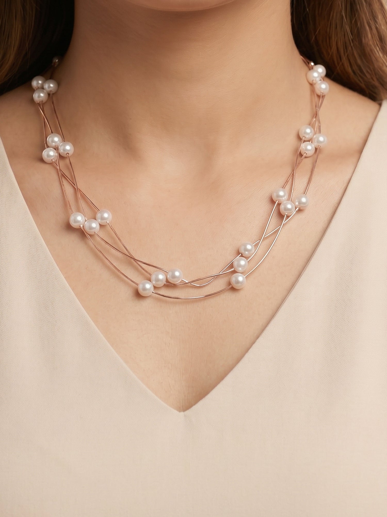Triple Strand Floating Pearl Station Necklace in Rose Gold