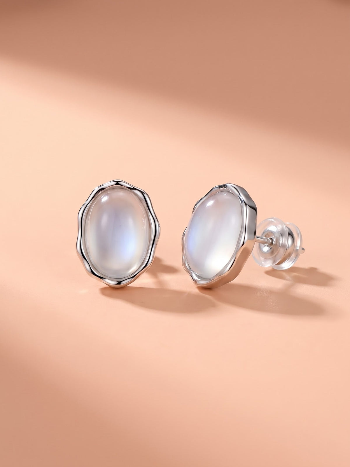 The Celestia Oval Moonstone Wave Stud Earrings