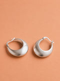 Sleek Silver Crescent Hoops