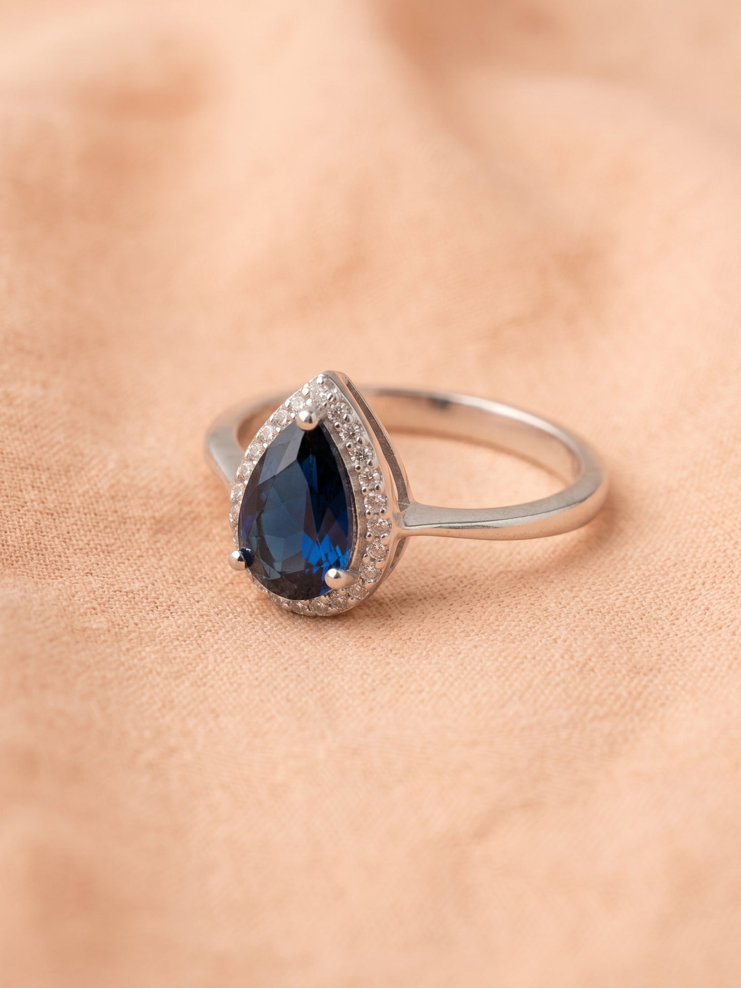 Blue Pear Cut Halo Ring