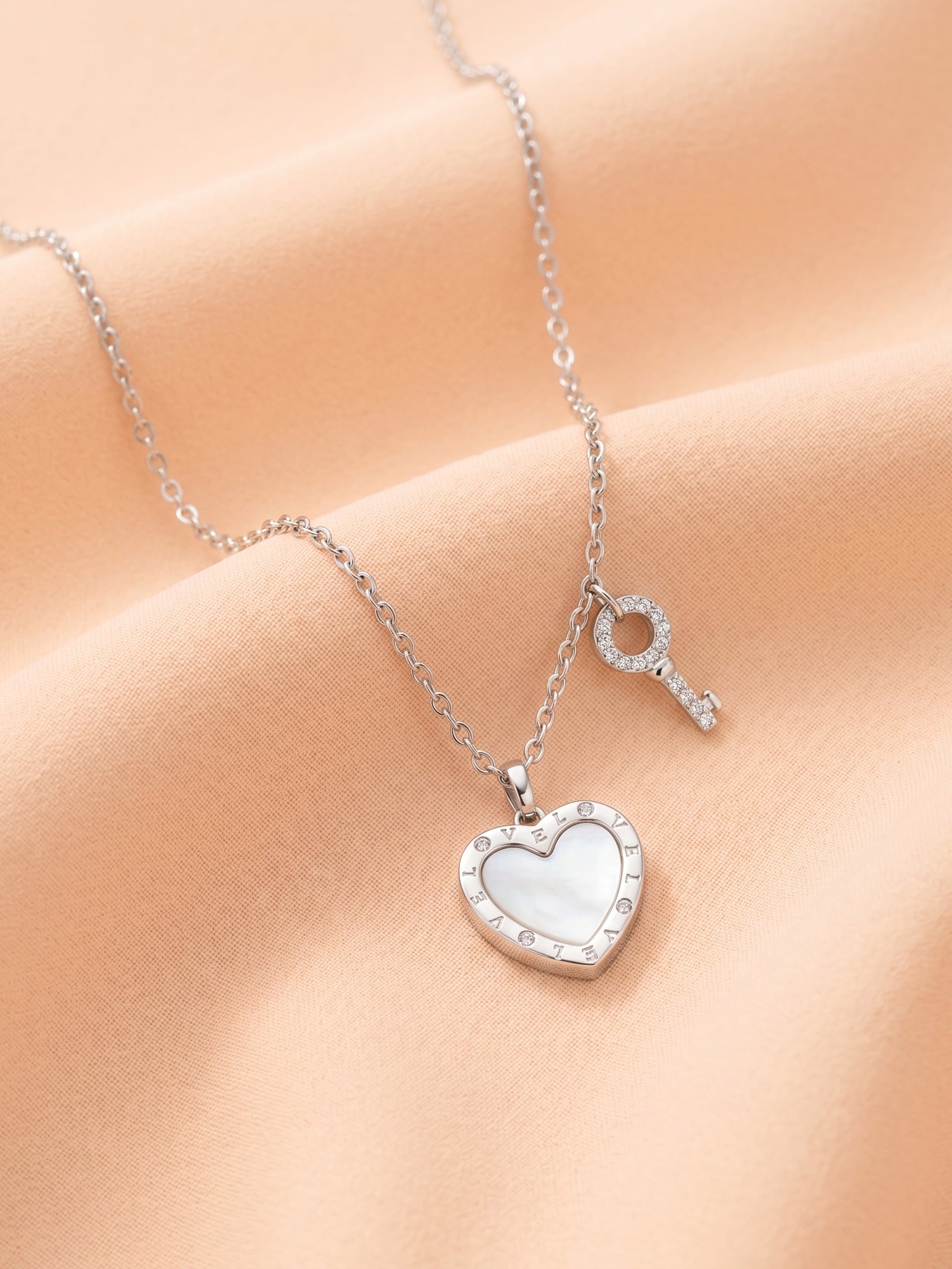 Reversible Mother of Pearl & Engraved Heart Necklace
