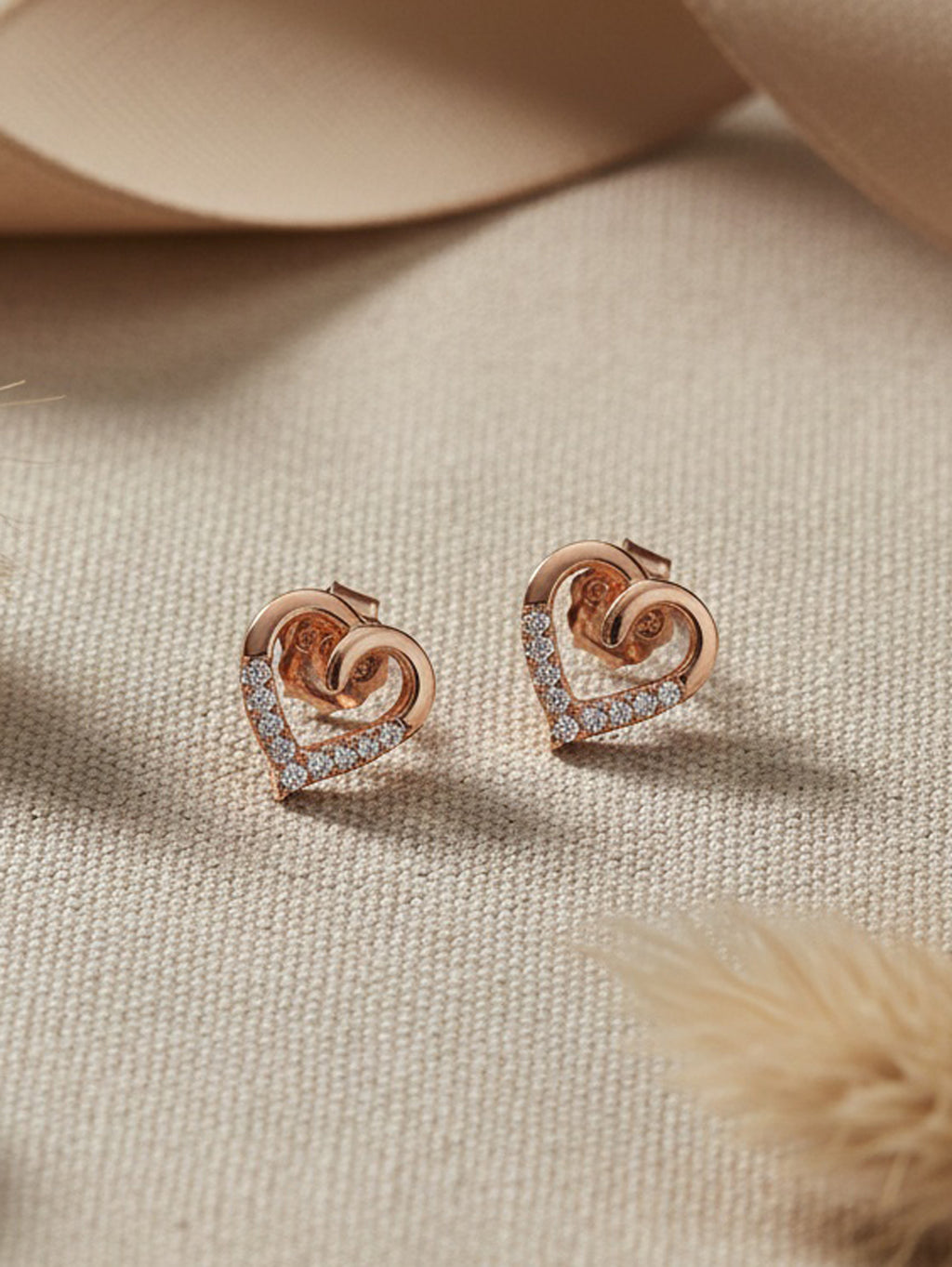 Radiant Entwined Heart Studs