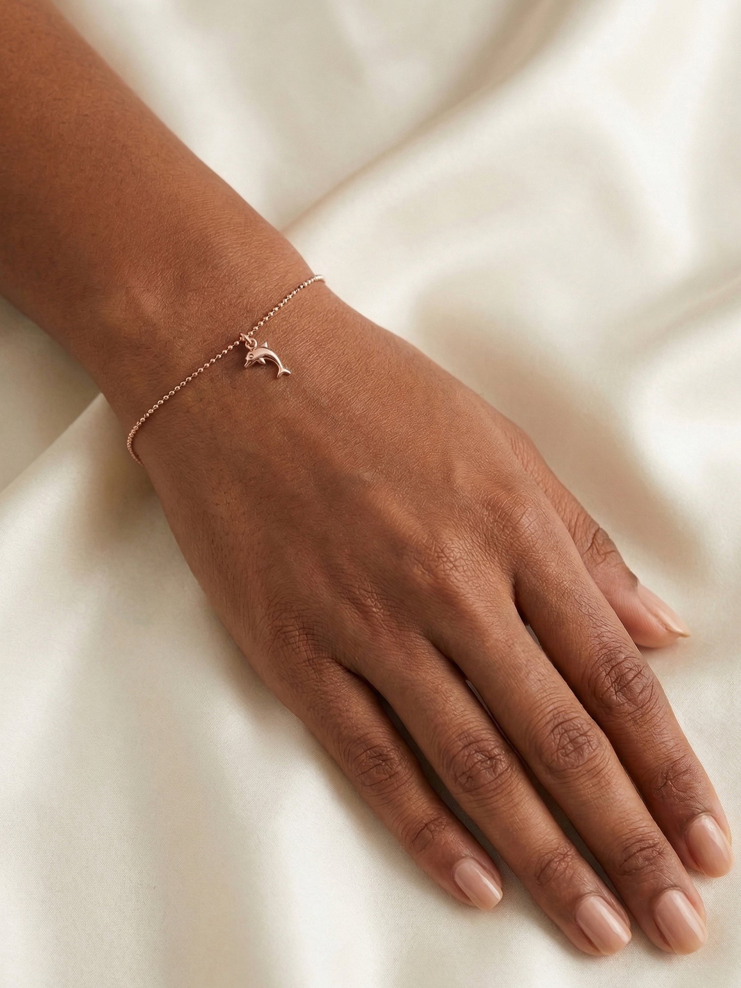 Roseate Playful Dolphin Charm Bracelet
