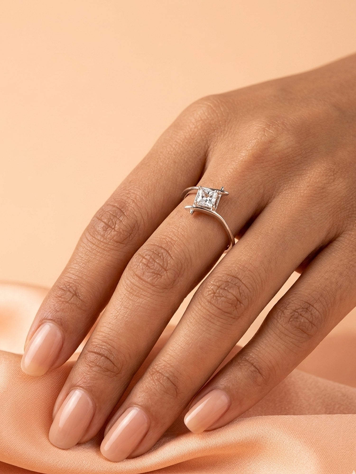 Kite-Oriented Princess Solitaire Ring