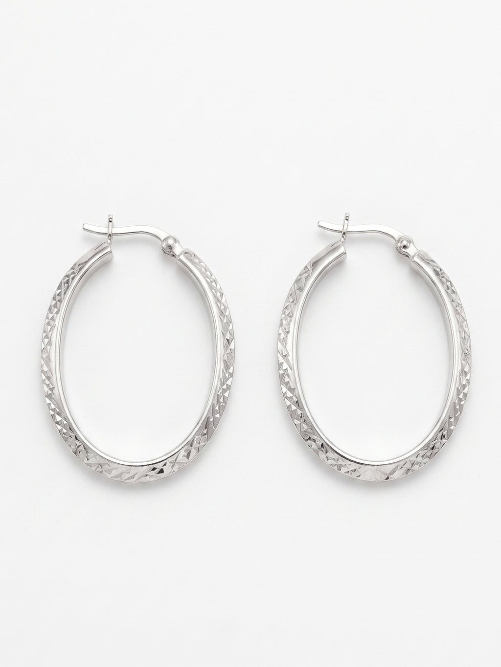Faceted Diamond-Cut Oval Hoop Earrings