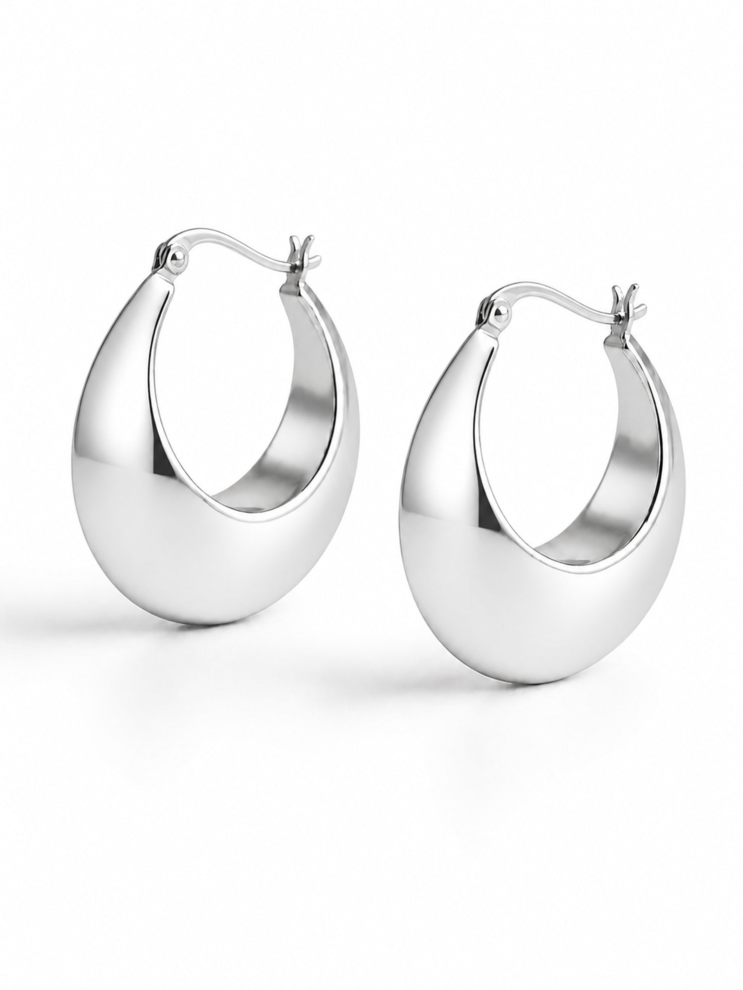 Sleek Silver Crescent Hoops