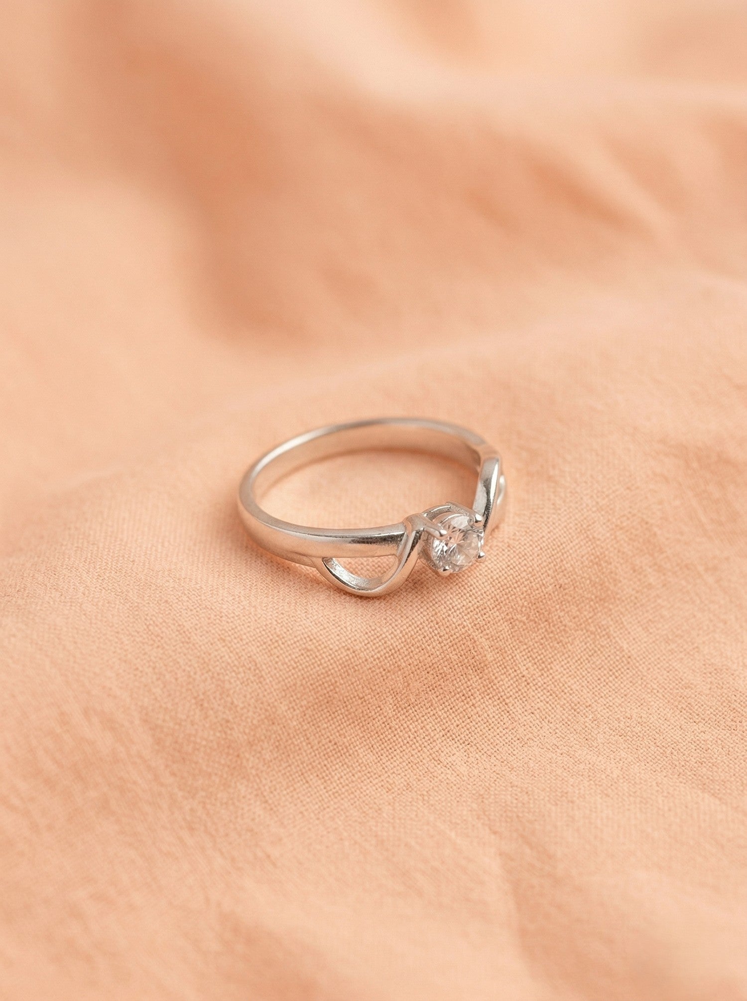 Entwined Ribbon Solitaire Ring
