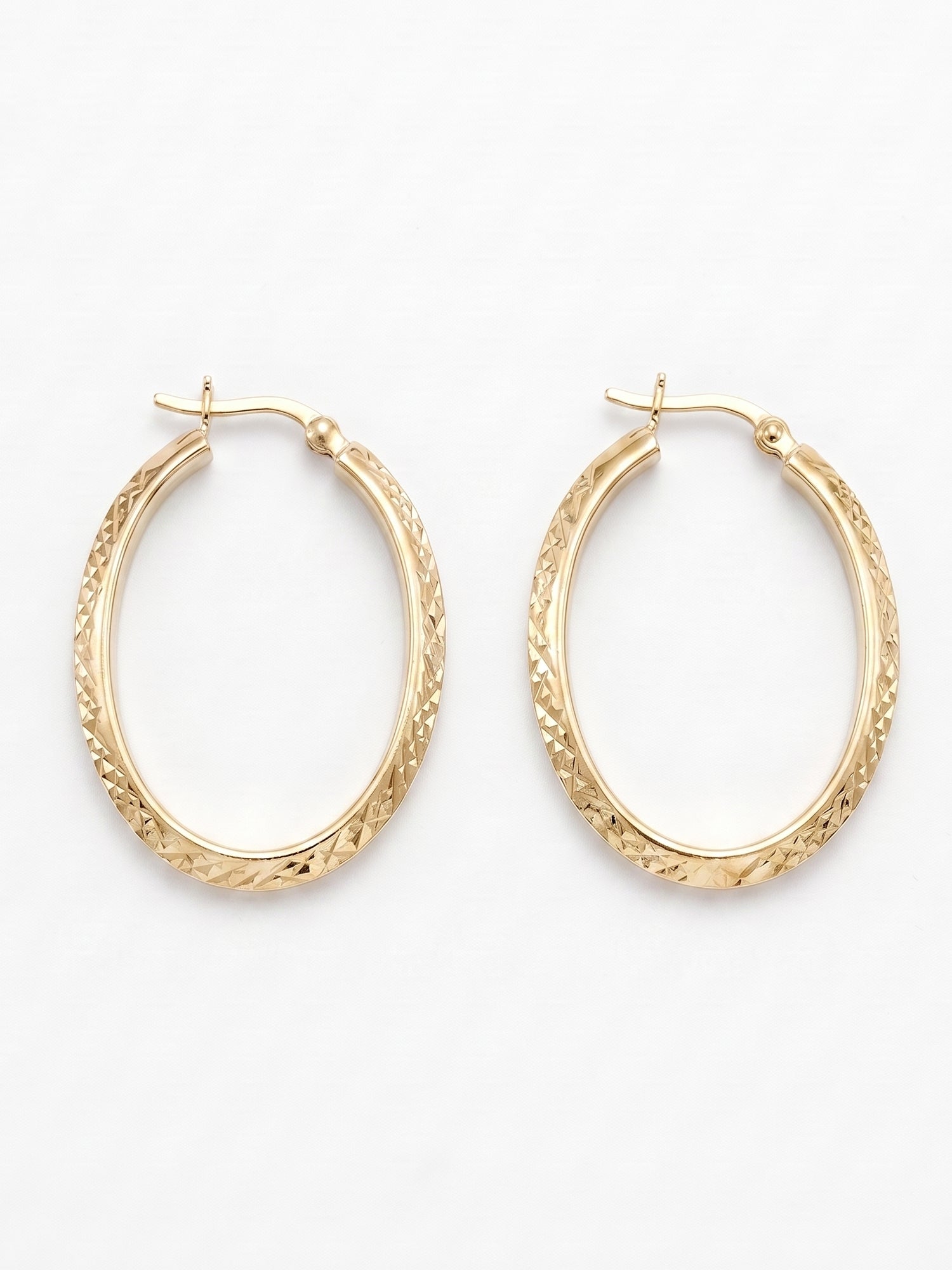 Diamond-Cut Oval Hoop Earrings
