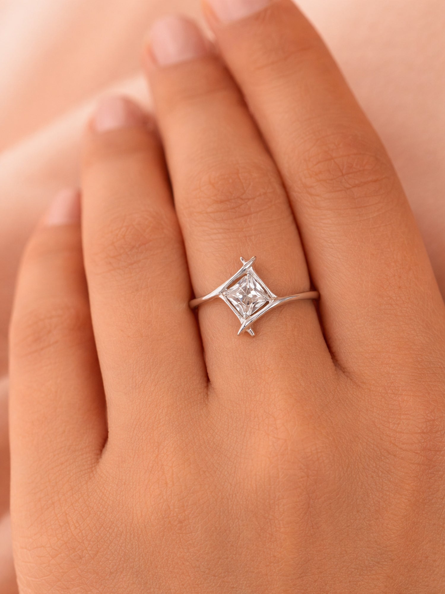 Kite-Oriented Princess Solitaire Ring