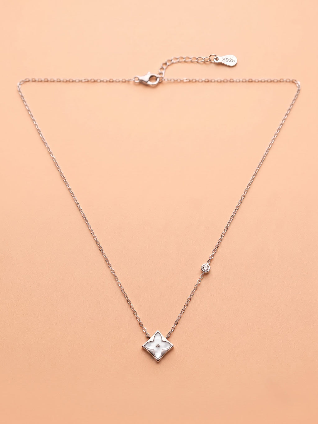 The Lumina Mother-of-Pearl Starburst Pendant Necklace