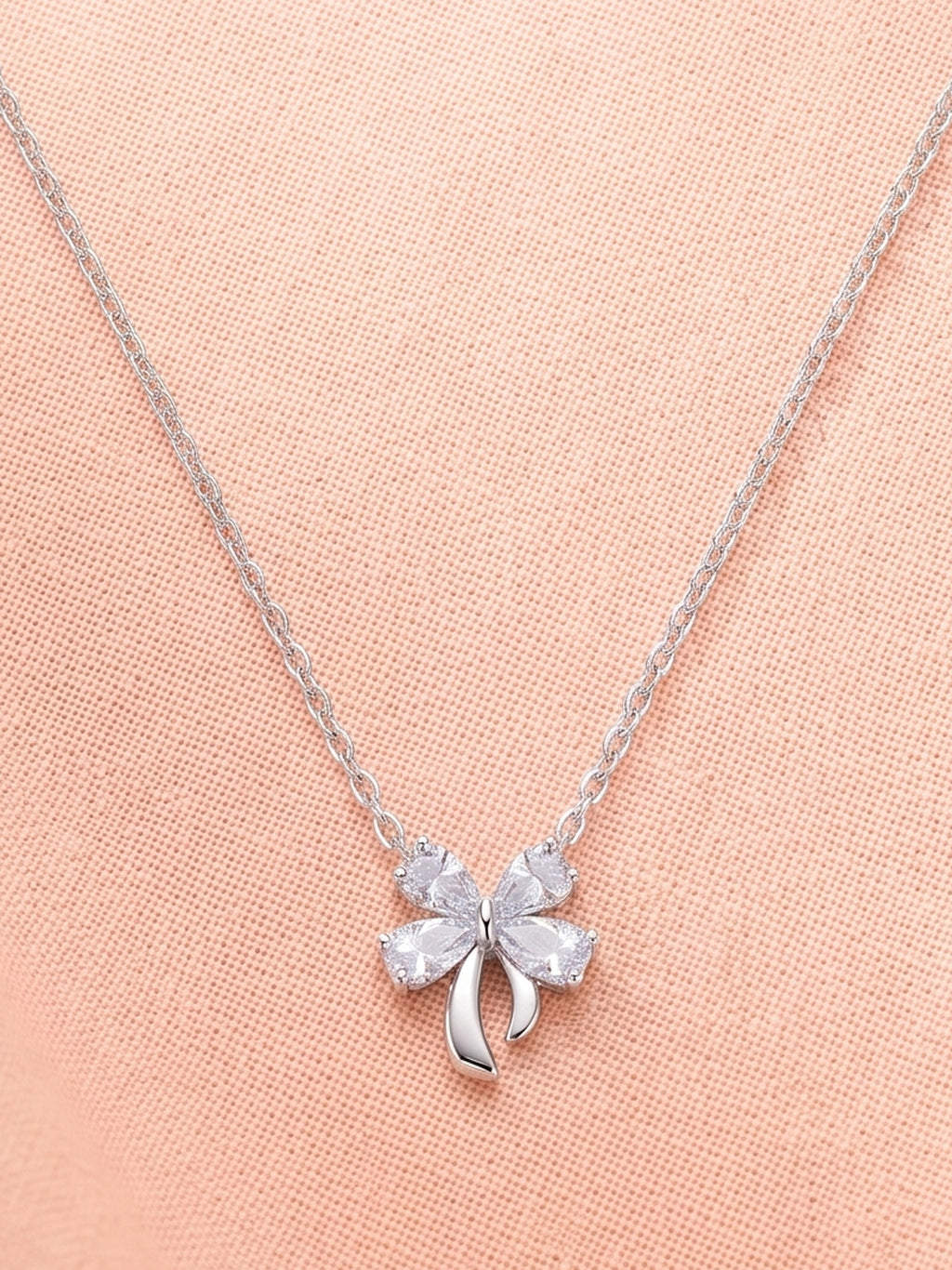Silver Shimmering Ribbon Bow Pendant Necklace