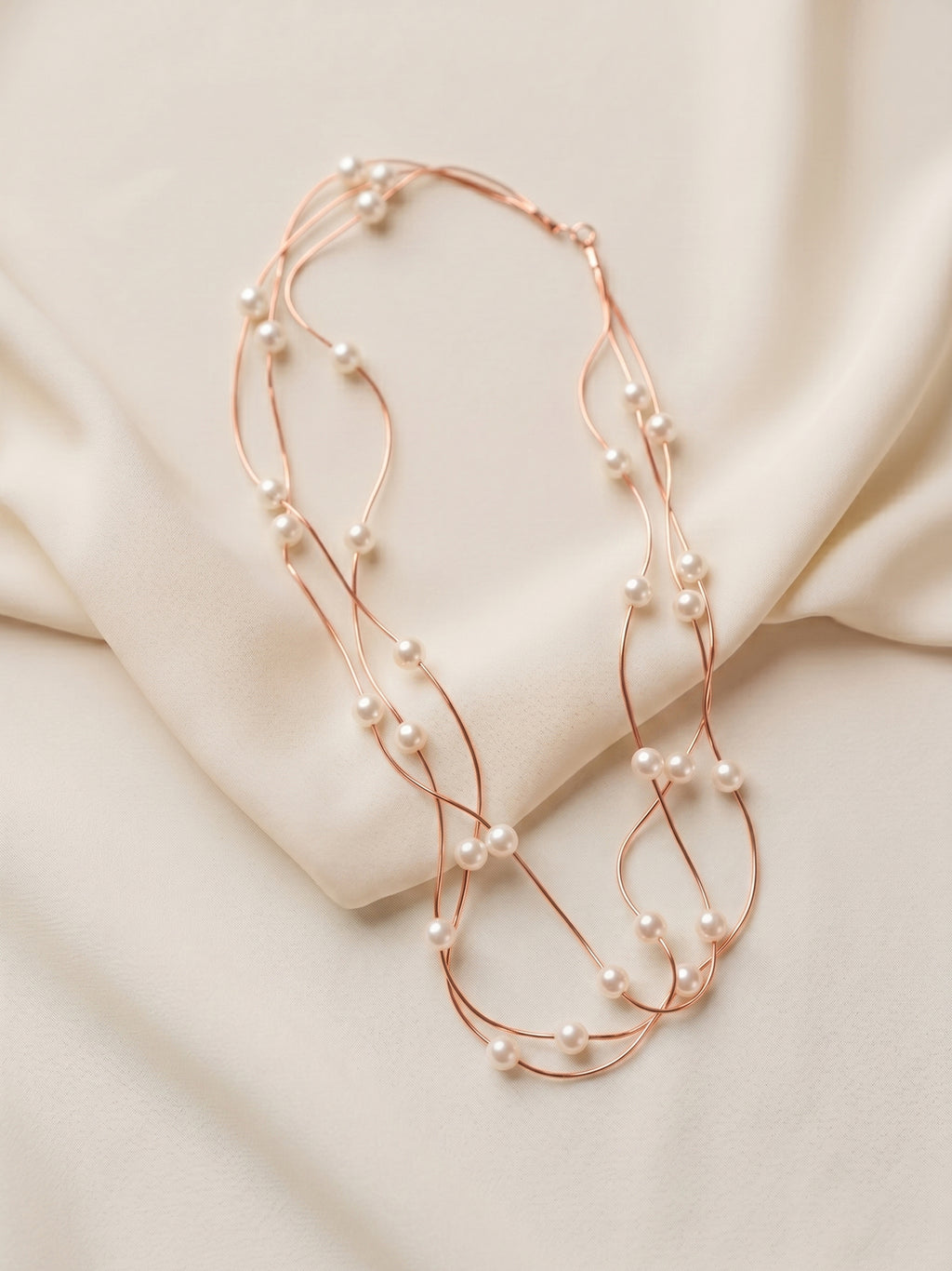 Triple Strand Floating Pearl Station Necklace in Rose Gold
