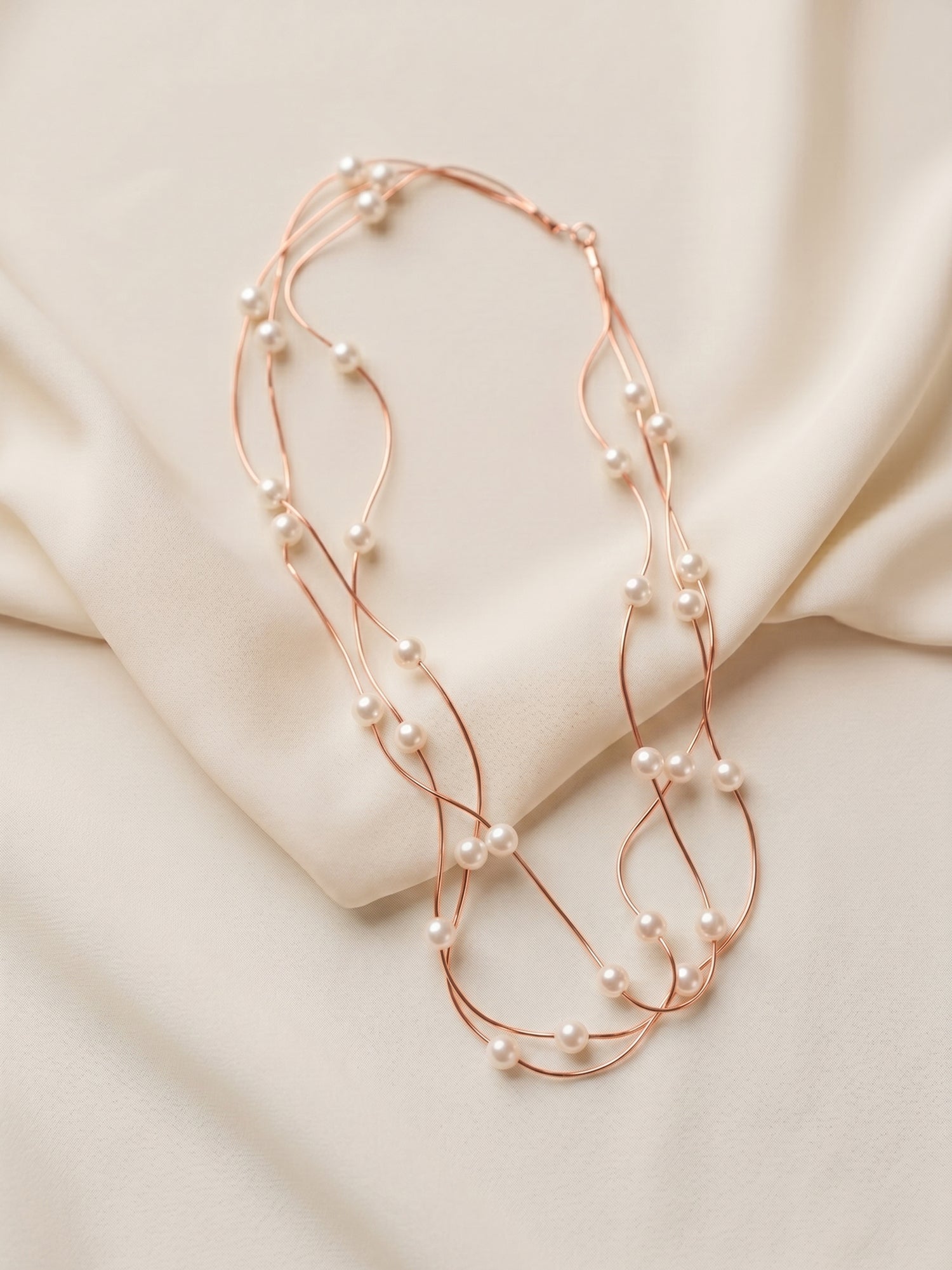 Triple Strand Floating Pearl Station Necklace in Rose Gold