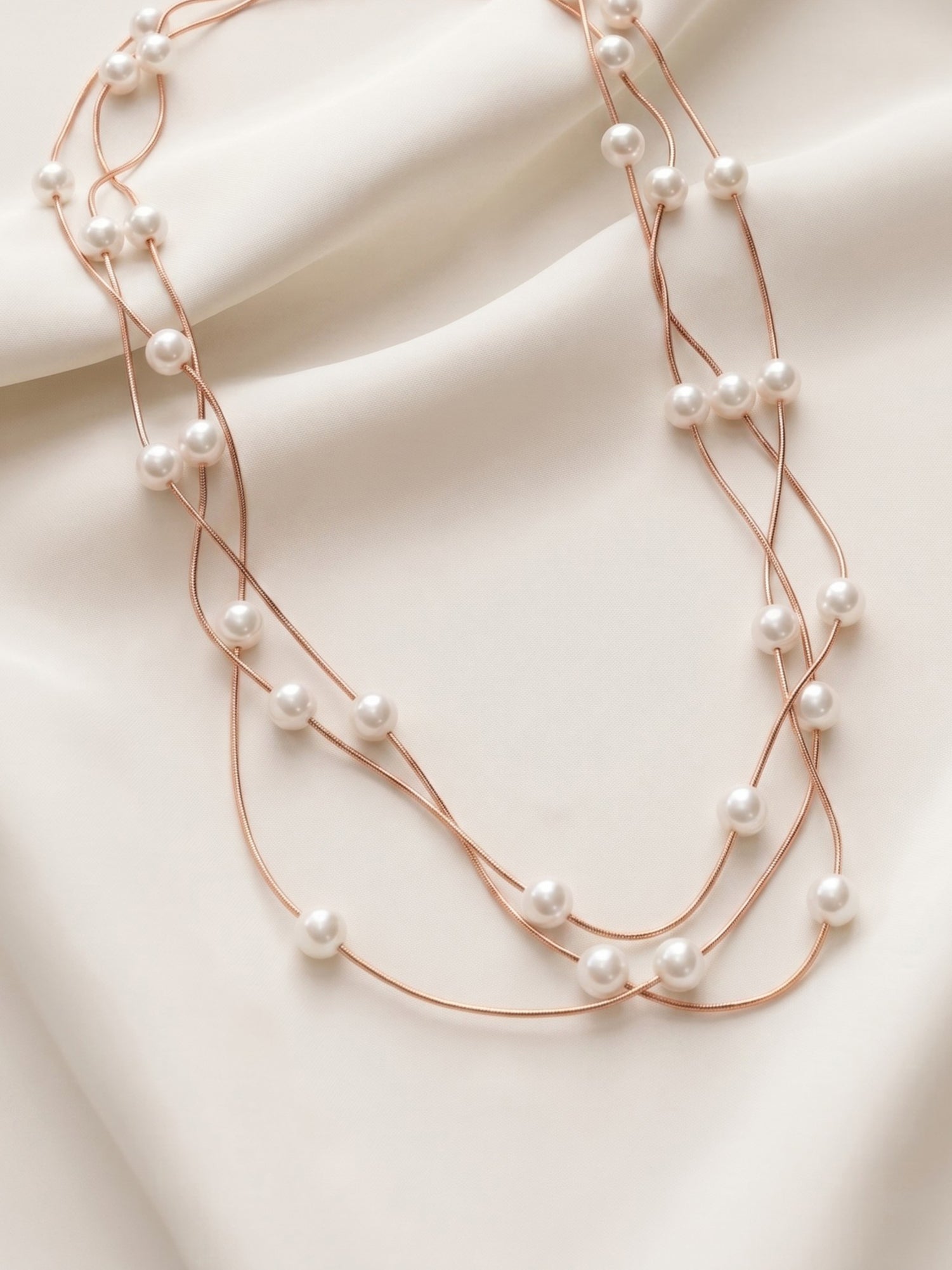 Triple Strand Floating Pearl Station Necklace in Rose Gold