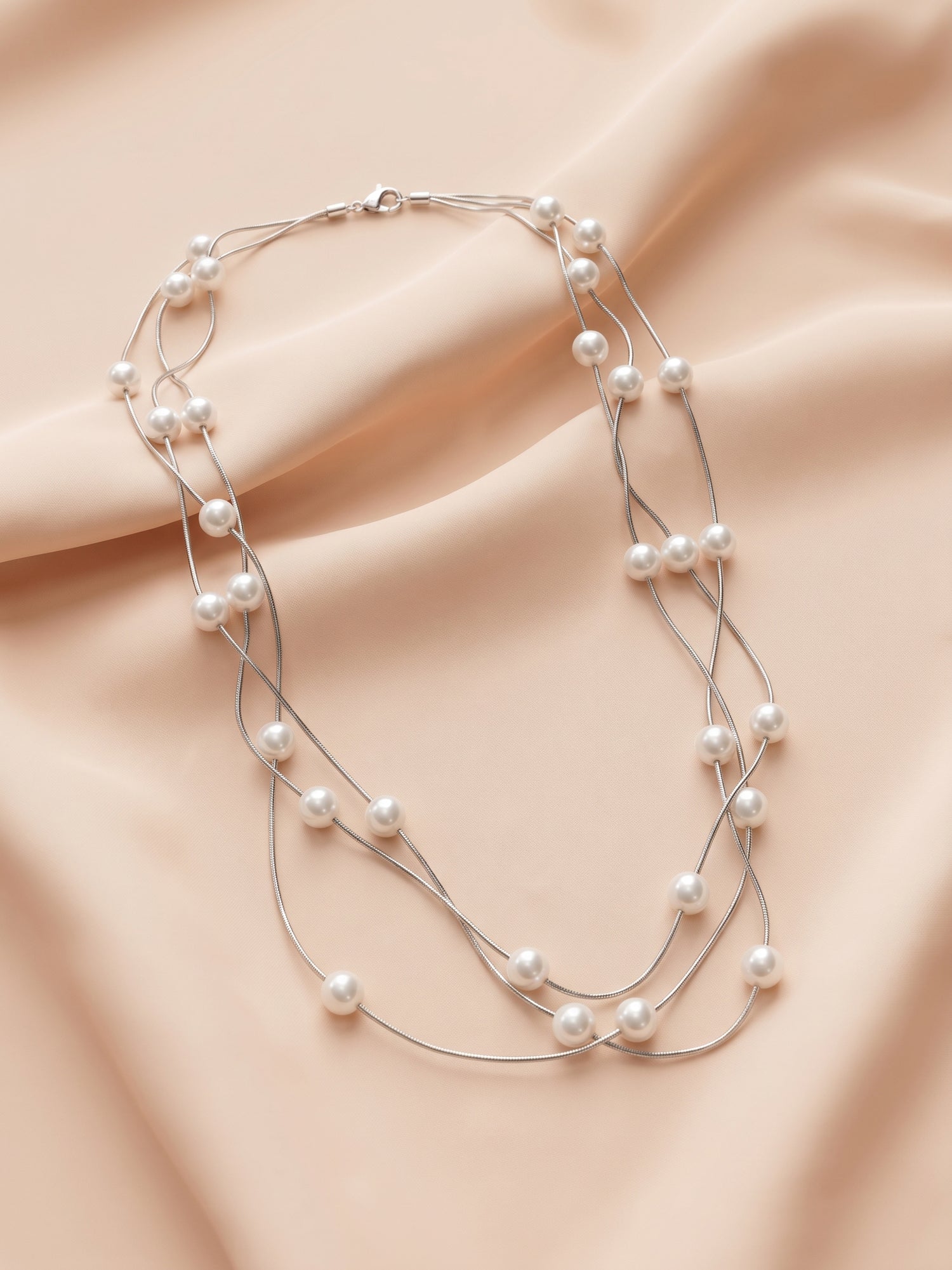 Triple Strand Floating Pearl Station Necklace