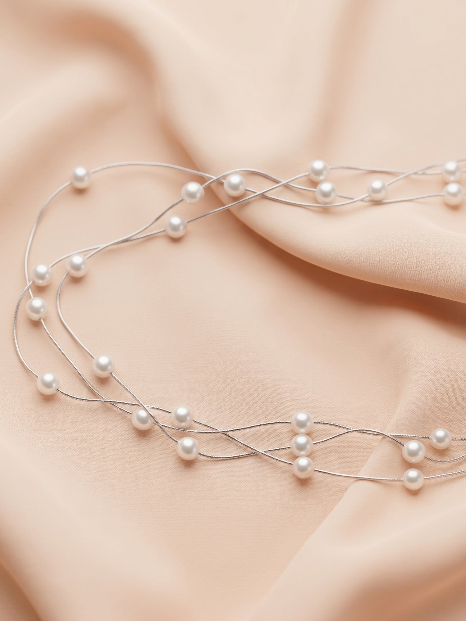 Triple Strand Floating Pearl Station Necklace