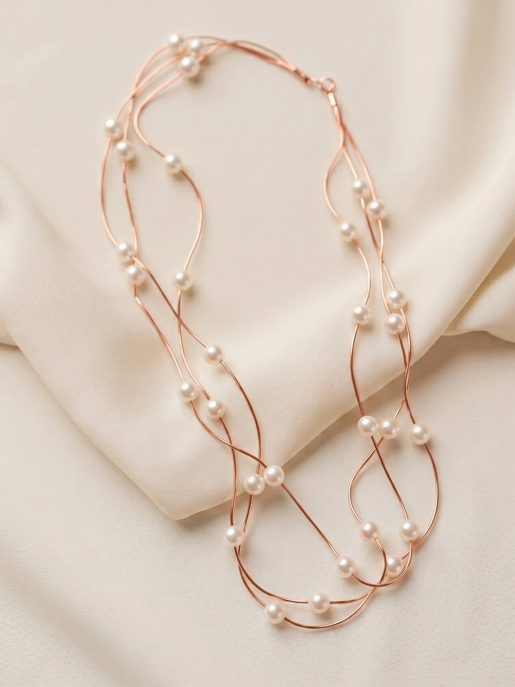 Triple Strand Floating Pearl Station Necklace in Rose Gold